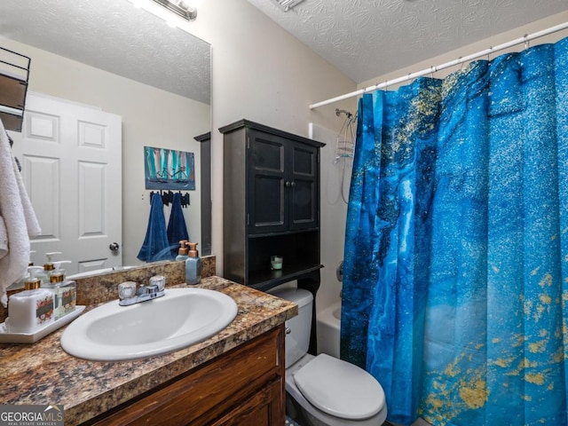 bathroom featuring shower / bath combination with curtain, a textured ceiling, vanity, and toilet