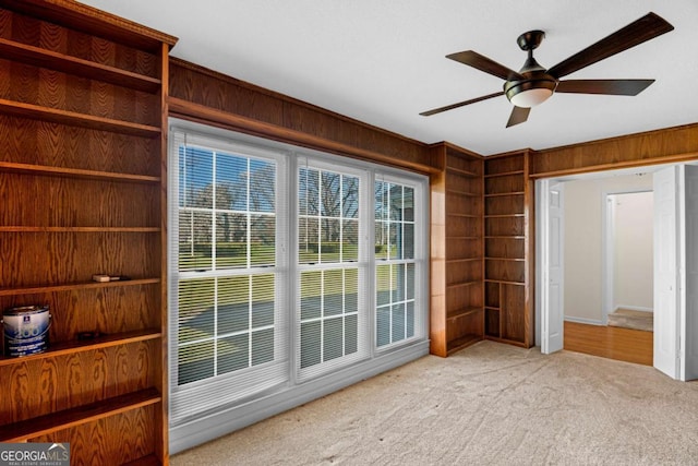 interior space featuring ceiling fan