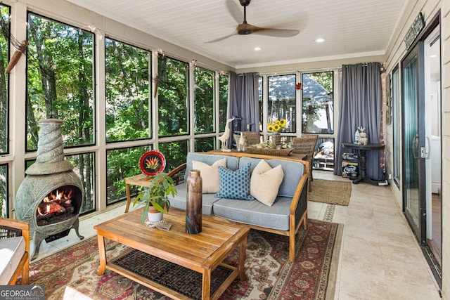 912 Mcelroy Mountain Dr, Big Canoe, GA 30143 - sunroom / solarium with a ceiling fan, an outdoor living space with a fireplace, a wood stove, and recessed lighting
