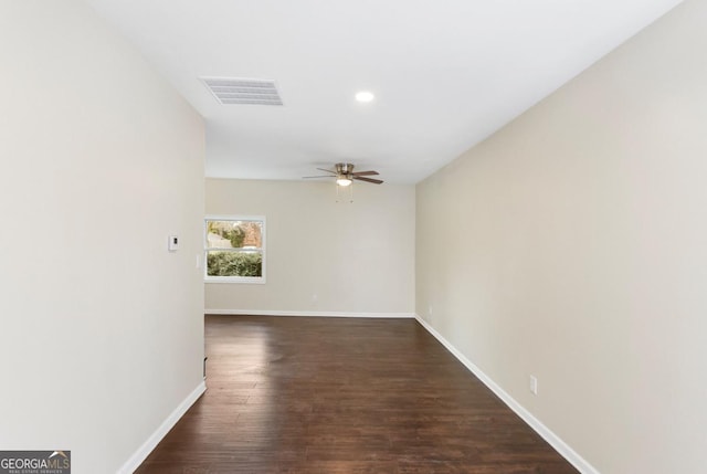 interior space featuring visible vents, baseboards, dark wood finished floors, recessed lighting, and a ceiling fan