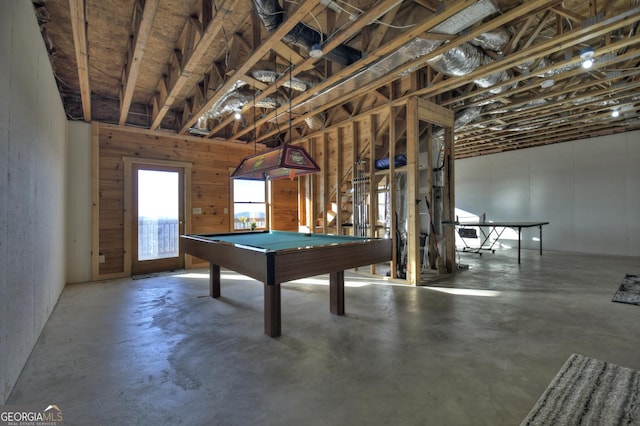 playroom featuring pool table and concrete flooring