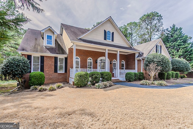 1621 Annapolis Way, Grayson, GA 30017 - view of front facade with brick siding and a porch