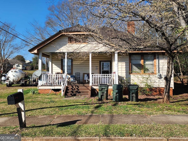 bungalow-style home with covered porch