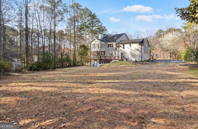 view of yard with a deck