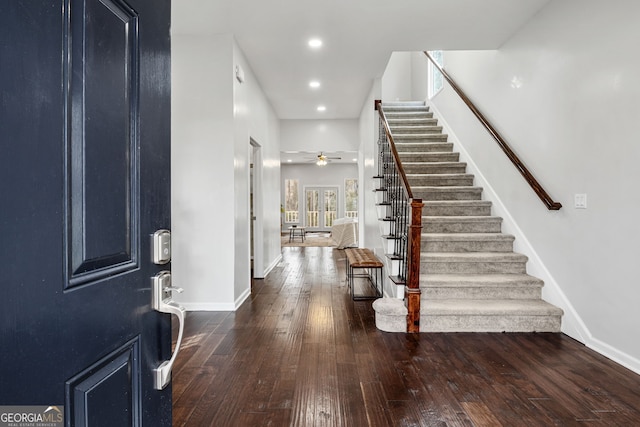 foyer featuring hardwood / wood-style floors, recessed lighting, stairway, baseboards, and ceiling fan