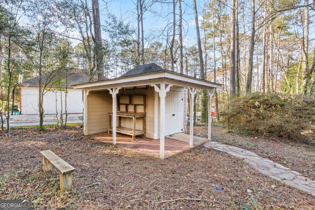 view of outbuilding featuring an outdoor structure