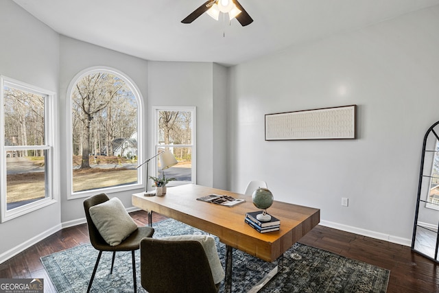 home office featuring dark wood-style floors, baseboards, and ceiling fan