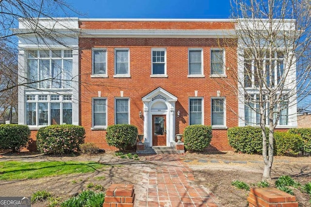 view of front of property featuring brick siding