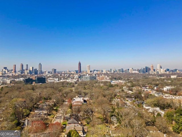 birds eye view of property featuring a view of city