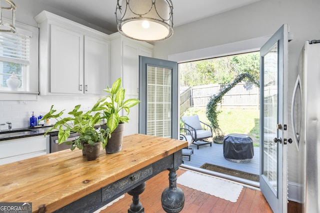 dining space featuring wood finished floors