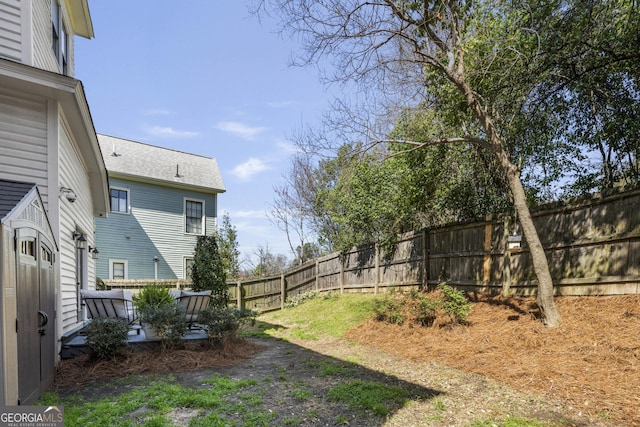 view of yard featuring fence