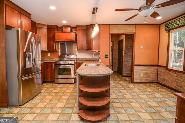 kitchen with a sink, premium range hood, appliances with stainless steel finishes, a peninsula, and open shelves