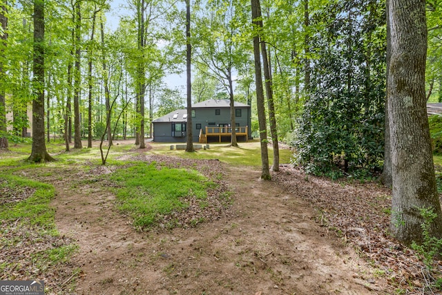 view of yard with a deck