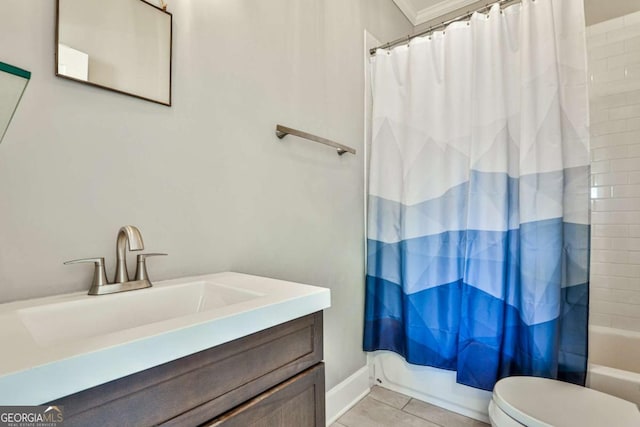 bathroom featuring tile patterned floors, vanity, toilet, and shower / tub combo