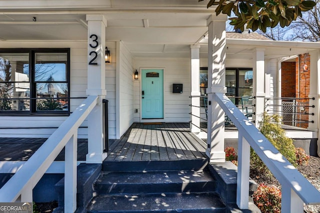 doorway to property featuring a porch