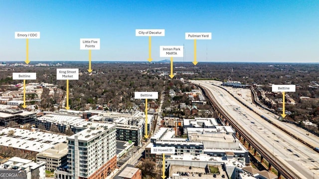 birds eye view of property featuring a view of city