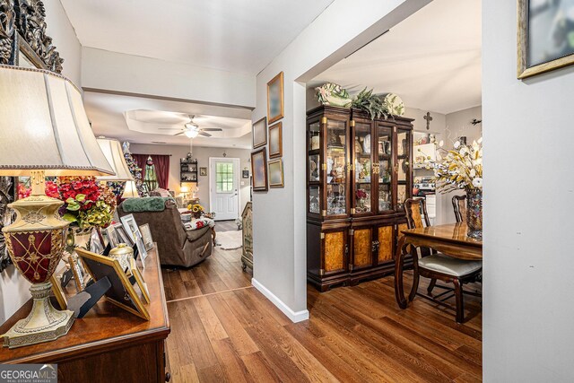 410 Bowen Rd NE, White, GA 30184 - hallway featuring baseboards and wood finished floors