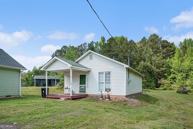 410 Bowen Rd NE, White, GA 30184 - view of front of property featuring covered porch and a front yard