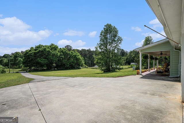410 Bowen Rd NE, White, GA 30184 - view of patio / terrace featuring ceiling fan