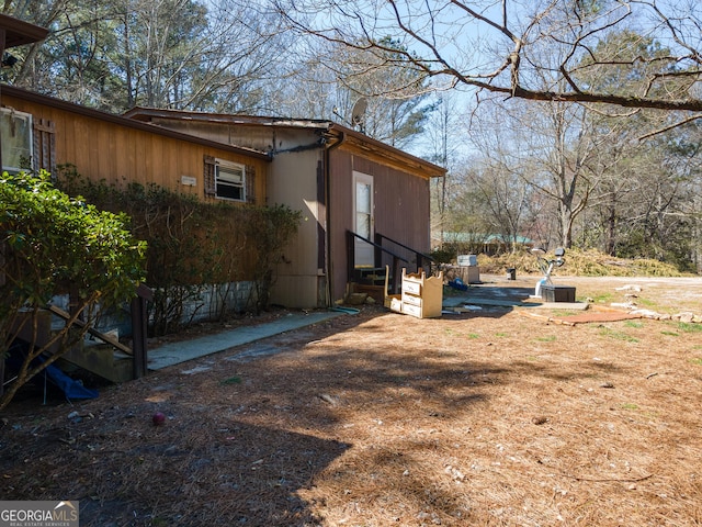 3150 Old Van Wert Rd, Villa Rica, GA 30180 - view of side of property featuring entry steps