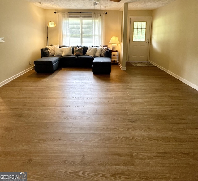 1537 David Lee St, Acworth, GA 30102 - living area featuring wood finished floors, baseboards, and ceiling fan