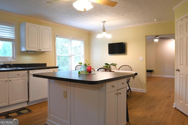 1537 David Lee St, Acworth, GA 30102 - kitchen featuring ceiling fan, dark countertops, dishwasher, a textured ceiling, and white cabinets