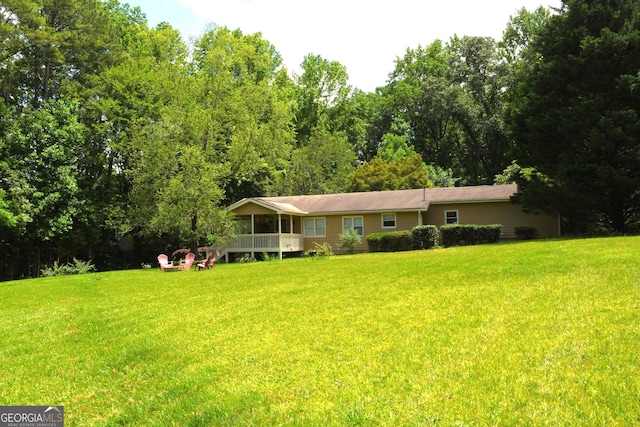 1537 David Lee St, Acworth, GA 30102 - back of house featuring a yard and a sunroom