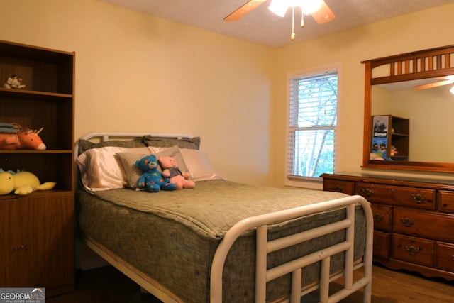 1537 David Lee St, Acworth, GA 30102 - bedroom with dark wood-style flooring and a ceiling fan