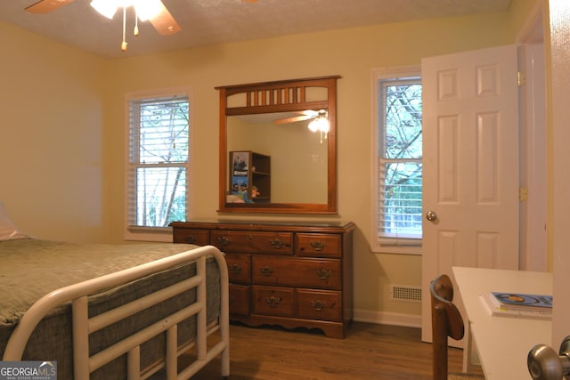 1537 David Lee St, Acworth, GA 30102 - bedroom featuring wood finished floors, multiple windows, and baseboards