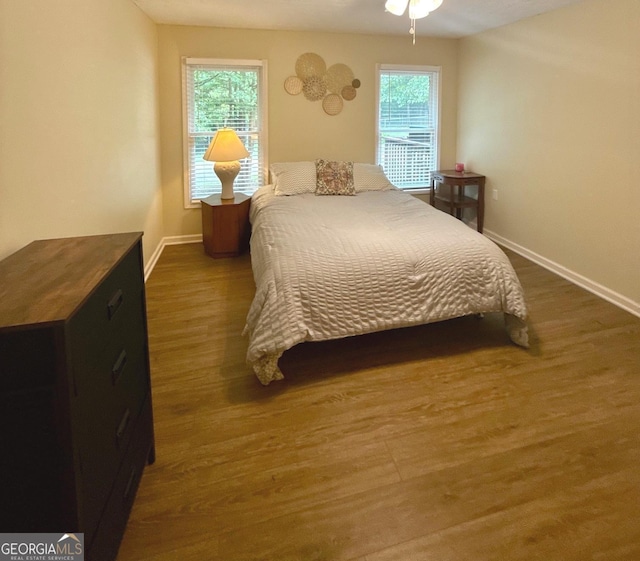 1537 David Lee St, Acworth, GA 30102 - bedroom with baseboards, wood finished floors, and ceiling fan
