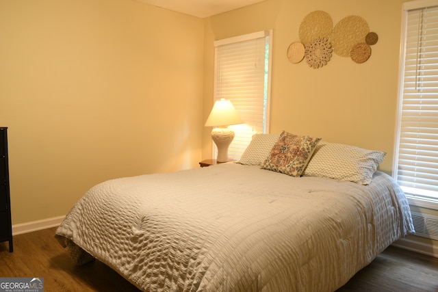 1537 David Lee St, Acworth, GA 30102 - bedroom featuring dark wood-type flooring and baseboards