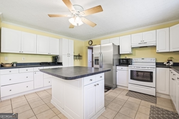kitchen featuring under cabinet range hood, dark countertops, black microwave, electric range, and stainless steel refrigerator with ice dispenser