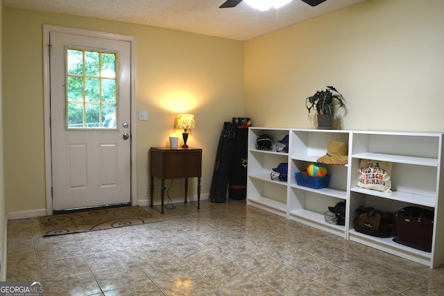 1537 David Lee St, Acworth, GA 30102 - tiled entrance foyer featuring ceiling fan and baseboards