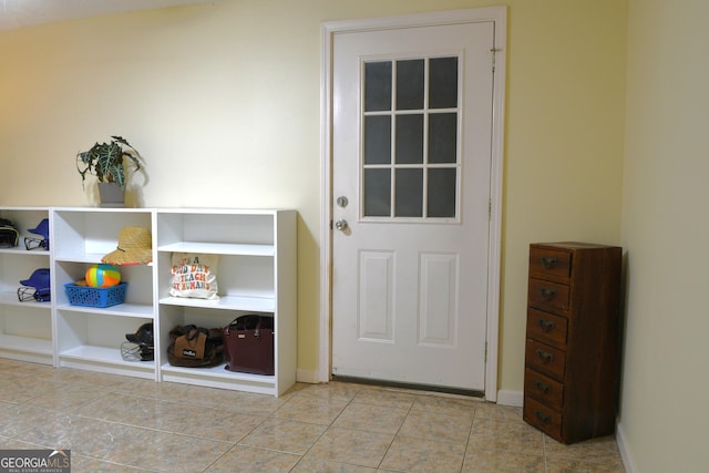 1537 David Lee St, Acworth, GA 30102 - doorway to outside with baseboards and tile patterned flooring