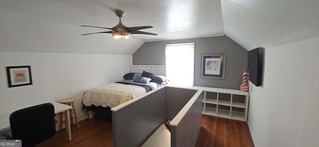 bedroom featuring vaulted ceiling, a ceiling fan, and dark wood-style flooring