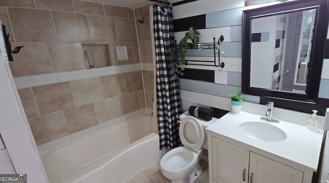 bathroom featuring toilet, vanity, and shower / bathtub combination with curtain