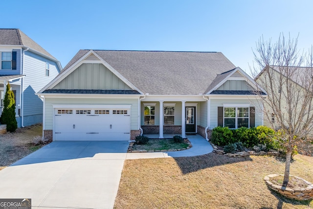 craftsman inspired home with an attached garage, board and batten siding, driveway, and a shingled roof