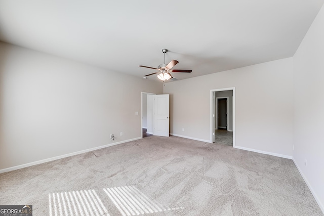 unfurnished bedroom featuring baseboards, carpet floors, and ceiling fan