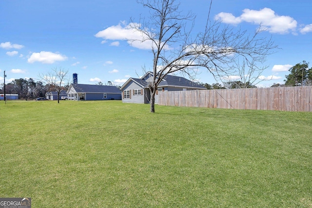 view of yard with fence