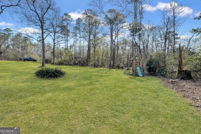 view of yard featuring a playground