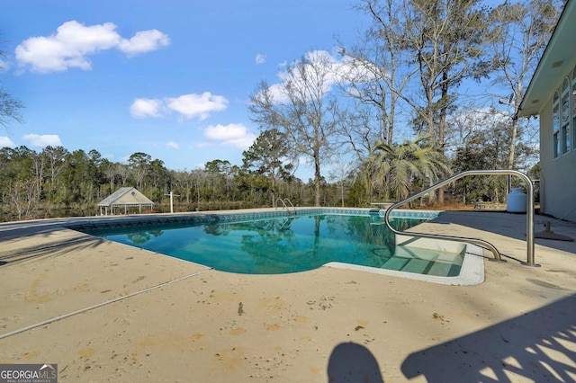 pool featuring a patio area