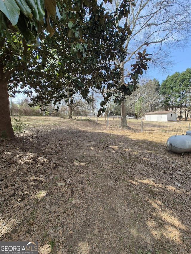 view of yard featuring fence