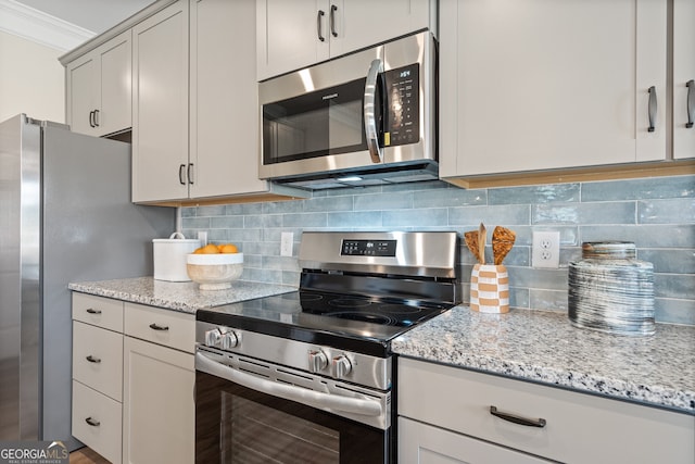146 Silver Leaf Trce, Douglasville, GA 30134 - kitchen with tasteful backsplash, stainless steel appliances, and light stone counters