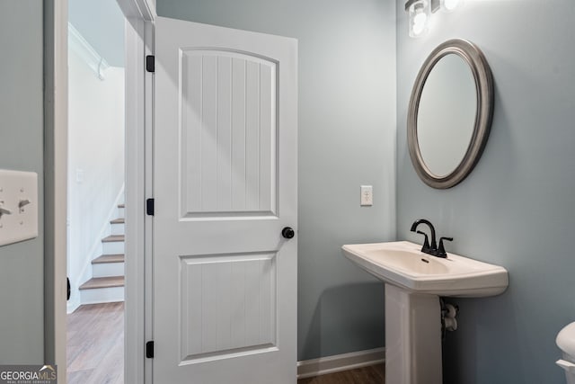 146 Silver Leaf Trce, Douglasville, GA 30134 - bathroom featuring toilet, wood finished floors, and baseboards
