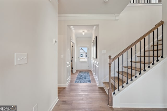 146 Silver Leaf Trce, Douglasville, GA 30134 - foyer with crown molding, stairway, wood finished floors, and baseboards