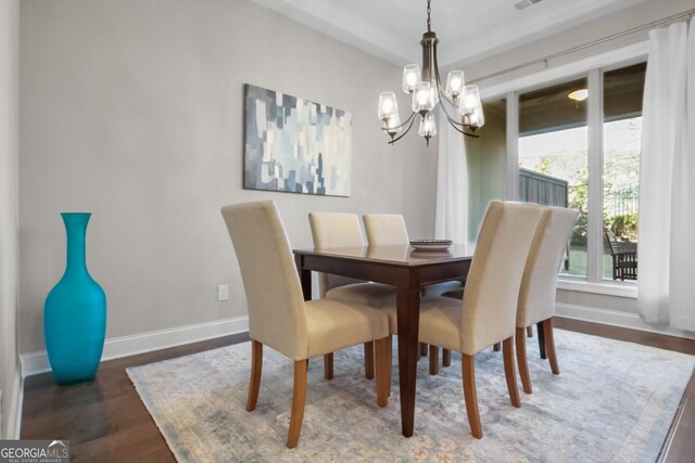 202 Via Lucca, Woodstock, GA 30188 - dining space with a chandelier, baseboards, and wood finished floors