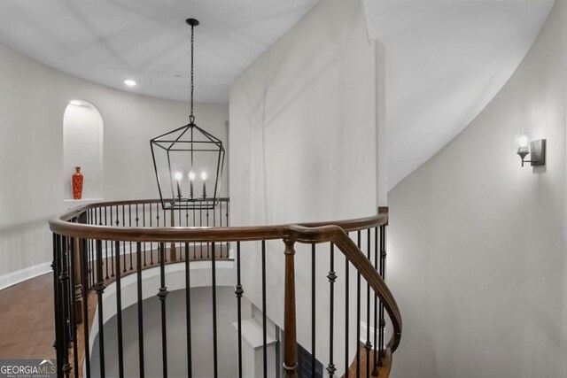 202 Via Lucca, Woodstock, GA 30188 - stairway featuring recessed lighting, baseboards, and a notable chandelier