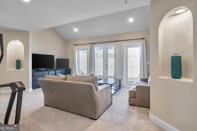 202 Via Lucca, Woodstock, GA 30188 - living area featuring baseboards, recessed lighting, vaulted ceiling, french doors, and light colored carpet