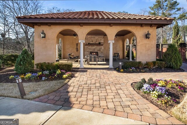 202 Via Lucca, Woodstock, GA 30188 - view of community with a gazebo, a patio area, and fence