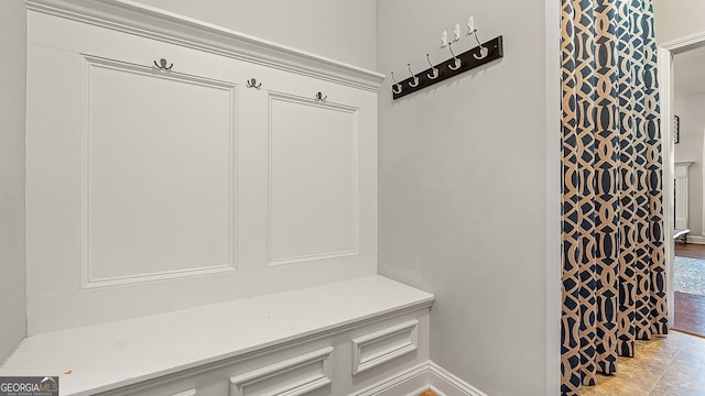 mudroom featuring baseboards